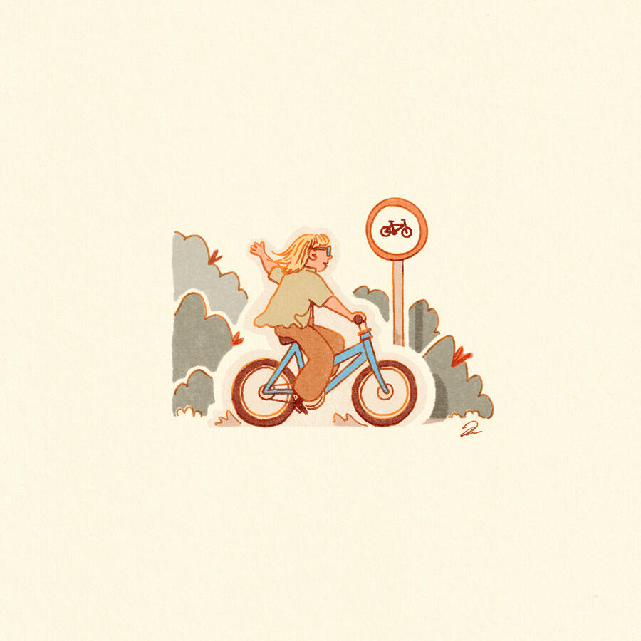 A girl with blonde hair is riding a blue bike past a no cycling sign. She has her arm stretched out to the side, perhaps with the intention of striking the sign
